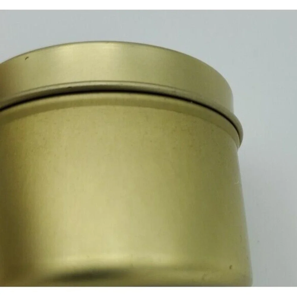 Paddywax Cedarwood and Teak White 2 oz Candle Gold Metal Tin Scratched Triangle‎